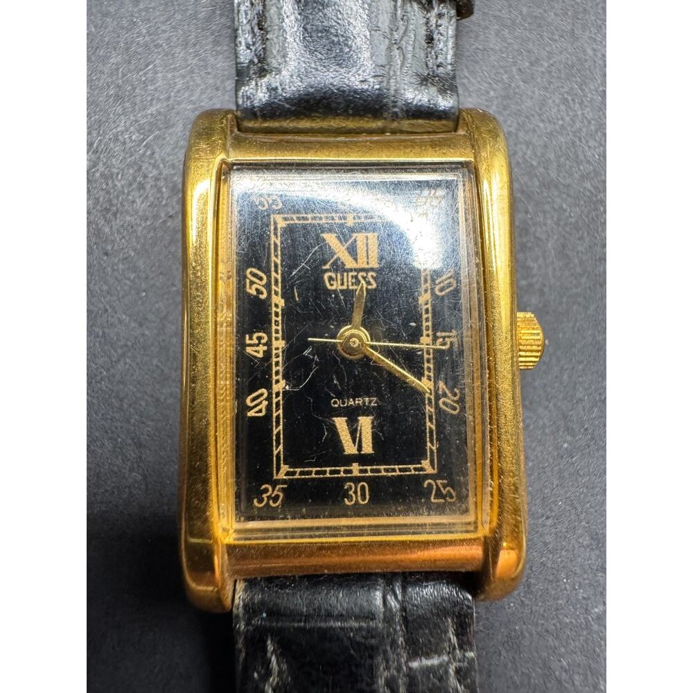 Guess 1988 Ladies Tank Quartz Watch Gold Tone Case 19MM Black Leather Band
